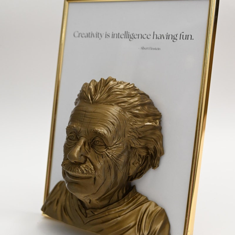 Einstein v okvirju z motivacijskim citatom – dekoracija za steno ali polico